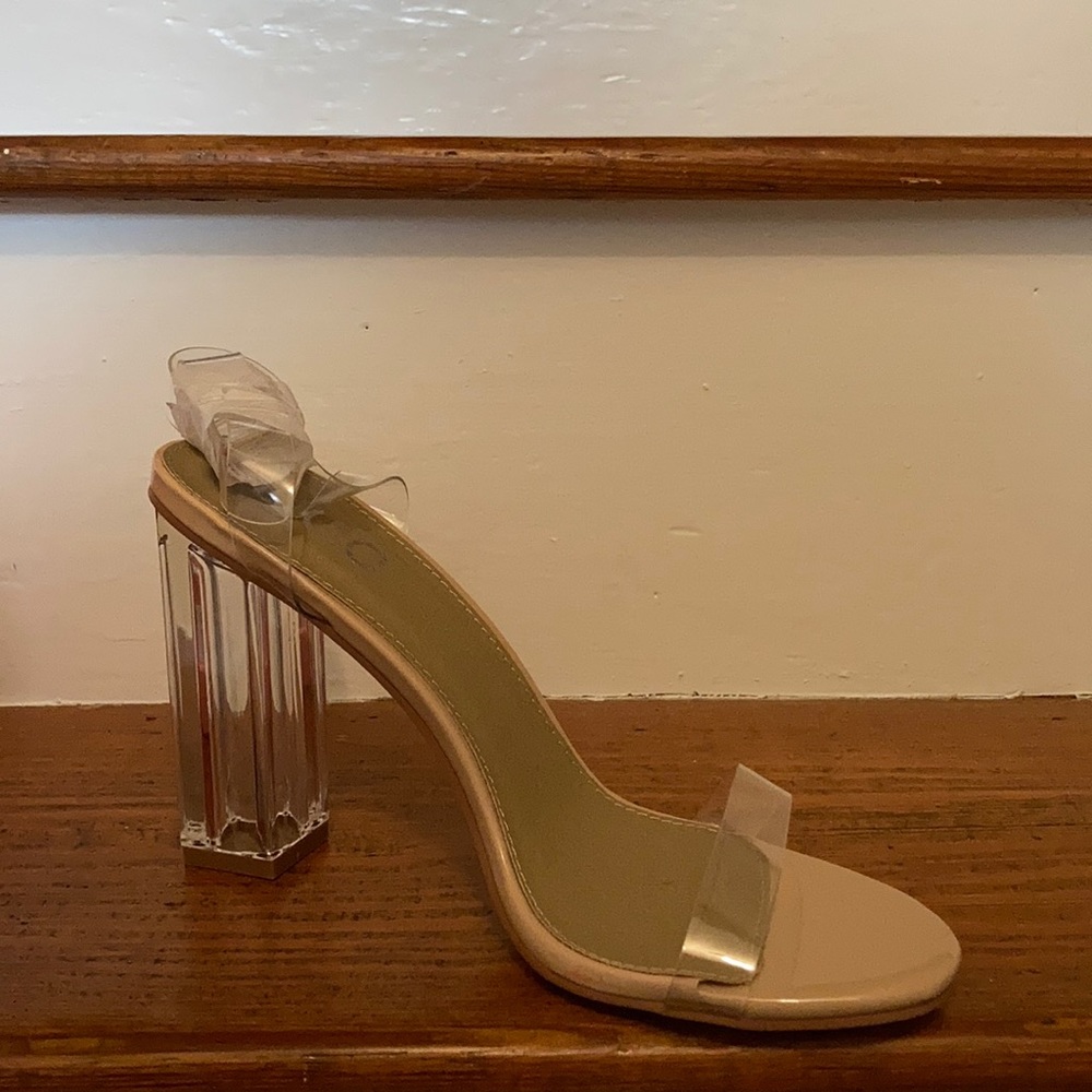 NEVER WORN OR UNPACKED clear nude heels